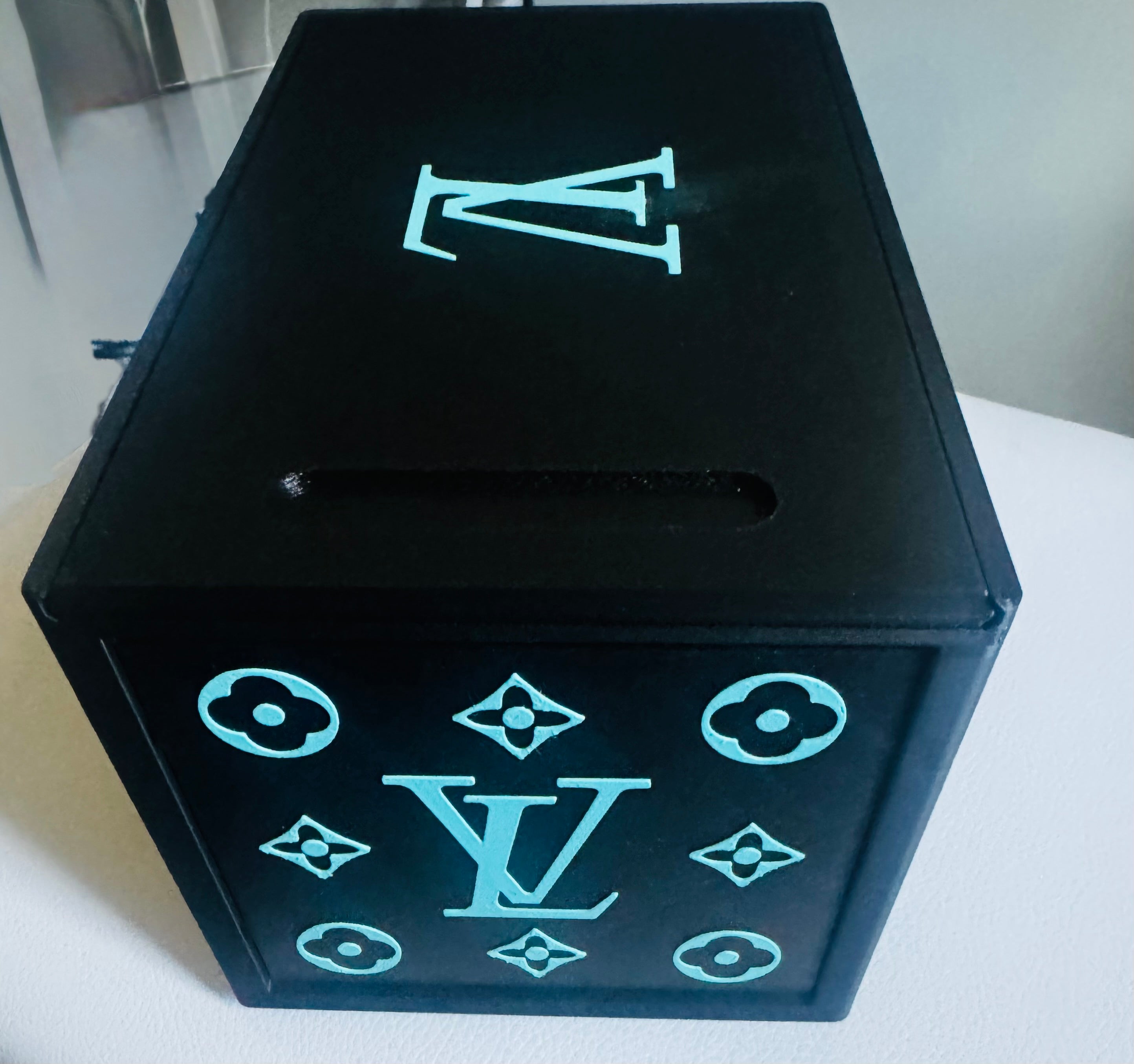 Black/teal multi purpose box with sliding lid